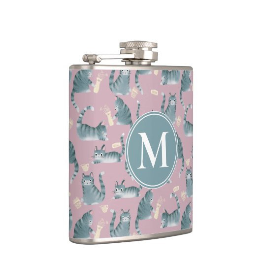 Schlechte graue Tablettenkatzen Knocken über und M Flachmann (Rechts)