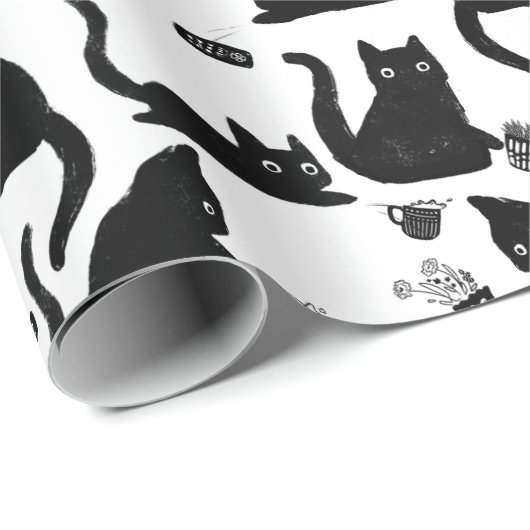 Schlechte Katzen klopfen über Geschenkpapier (Rolleneckpunkt)