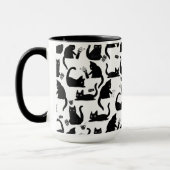 Schlechte Katzen klopfen über Tasse (Links)