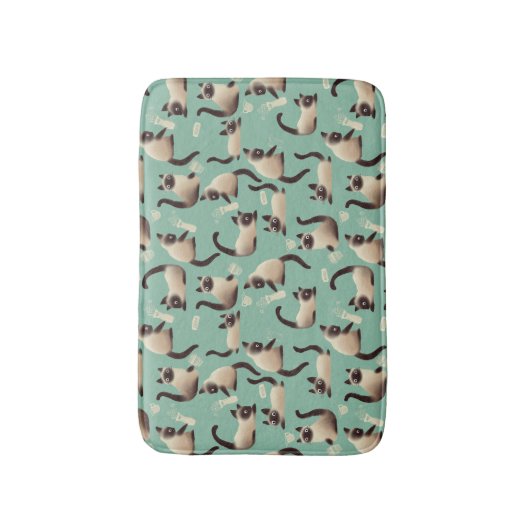 Schlechte siamesische Katzen klopfen über Badematte (Vorderseite Vertikal)