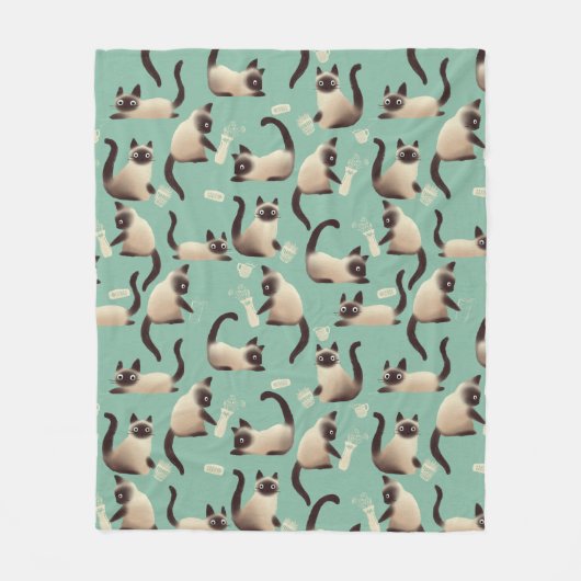 Schlechte siamesische Katzen klopfen über Fleecedecke (Vorderseite)