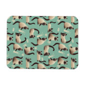 Schlechte siamesische Katzen klopfen über Magnet (Horizontal)