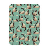 Schlechte siamesische Katzen klopfen über Magnet (Vertikal)