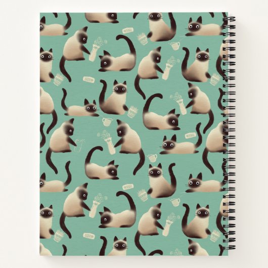 Schlechte siamesische Katzen klopfen über Notizblock (Rückseite)