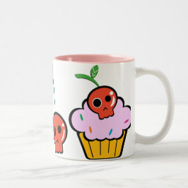 Schlechter kleiner Kuchen und schlechte Cherrys Zweifarbige Tasse