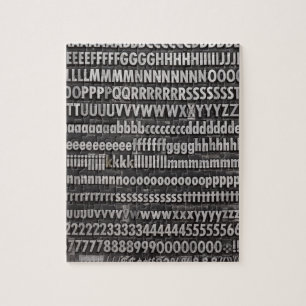 Schließen Sie Schriftart-Briefbeschwerer-Art ab Puzzle