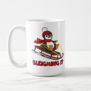 Schlitten - Niedlicher Pinguin im Schnee Kaffeetasse