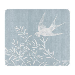 Schlucken von Vögeln, die über Olivenzweige fliege Schneidebrett