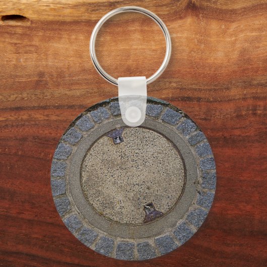 Schlüsselanhänger mit Manhole-Abdeckung und Kopfst (Vorderseite)