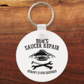 Schlüsselanhänger mit Saucer-Repair-Logo des schwa (Vorderseite)