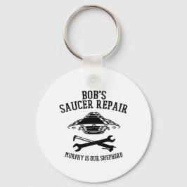 Schlüsselanhänger mit Saucer-Repair-Logo des schwa