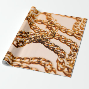 Schmale goldene Ketten auf reflektierender Oberflä Geschenkpapier