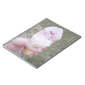 Schmelze Eiscreme im HandNotebook Notizblock (Linke Seite)