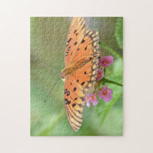Schmetterling auf einer Blume in einem Park Puzzle