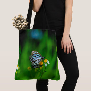 Schmetterling auf einer Blume Tasche
