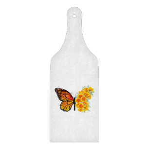 Schmetterling mit gelbem Kalifornischen Mohn Schneidebrett