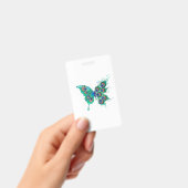 Schmetterling mit grünen Pfauenfedern Ausweis (Handheld)