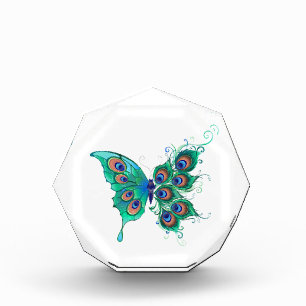 Schmetterling mit grünen Pfauenfedern Fotoblock