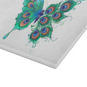 Schmetterling mit grünen Pfauenfedern Schneidebrett (Ecke)
