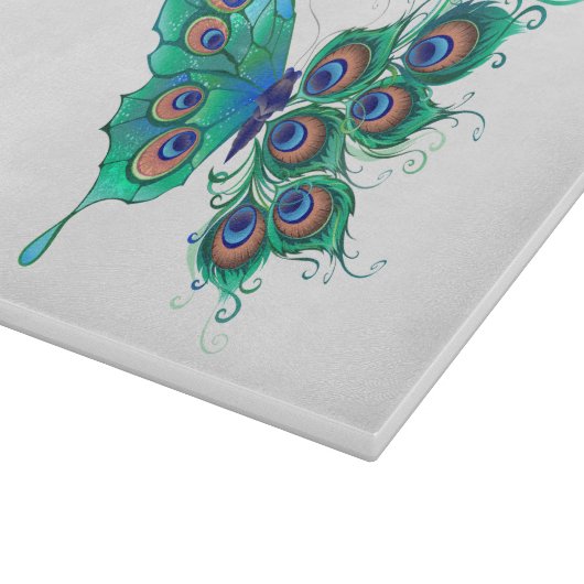 Schmetterling mit grünen Pfauenfedern Schneidebrett (Ecke)