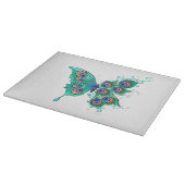 Schmetterling mit grünen Pfauenfedern Schneidebrett (Ecke)