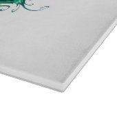 Schmetterling mit grünen Pfauenfedern Schneidebrett (Ecke)