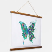 Schmetterling mit grünen Pfauenfedern Wandteppich Mit Holzrahmen (Gewinkelt)