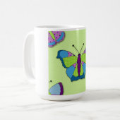 Schmetterling-Patchworkmuster auf Grün Kaffeetasse (Vorderseite Links)