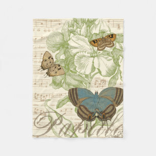 Schmetterlinge auf Notenpapier mit Blumendesign Fleecedecke