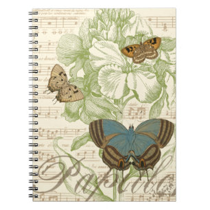 Schmetterlinge auf Notenpapier mit Blumendesign Notizblock