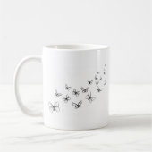 Schmetterlinge tanzen über die Seite Kaffeetasse (Links)