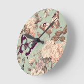 Schmetterlinge und Blume pastellgrün Runde Wanduhr (Winkel)