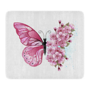 Schmetterlingsblume mit rosa Sakura Schneidebrett
