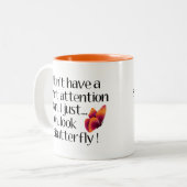 Schmetterlingseffekt, Kurze Aufmerksamkeitsspinne Zweifarbige Tasse (Vorderseite Links)