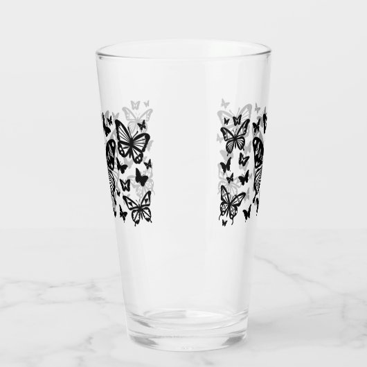 Schmetterlingsegnen in Schwarz Glas (Links)