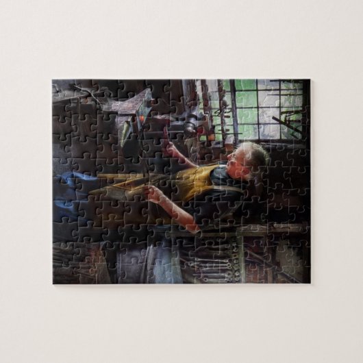 Schmied - Beginnend mit einem Knall Puzzle (Horizontal)