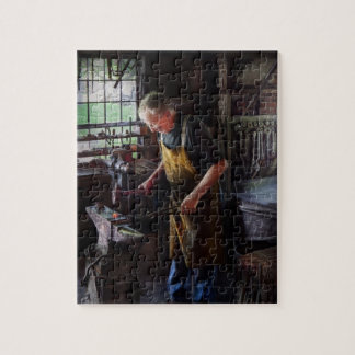 Schmied - Beginnend mit einem Knall Puzzle