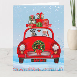 Schnauzer Hund in Auto mit dem Weihnachtsmann Karte