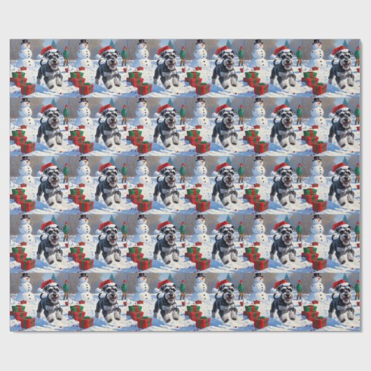 Schnauzer läuft im Schnee mit Weihnachtshut Geschenkpapier (Flach)