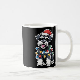 Schnauzer wackelte in Weihnachtslicht Kaffeetasse