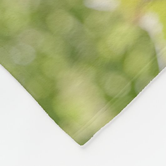 Schnauzer Welpe im blühenden Garten Fleecedecke (Ecke)