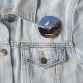 Schnee auf blauer Himmel-alpinem Waldknopf Button (Beispiel)