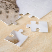 Schnee-Leopard im Schnee Puzzle (Seite)