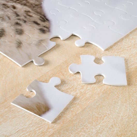 Schnee-Leopard im Schnee Puzzle (Seite)