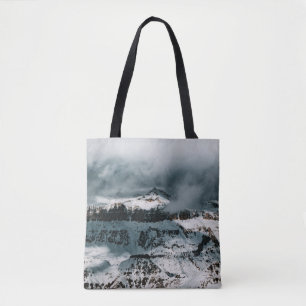 SCHNEE ÜBERDECKTER BERG UNTER SCHLAUBERHEIT AM TAG TASCHE