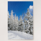 Schneebäume unter einem klaren blauen Himmel im Puzzle (Vertikal)