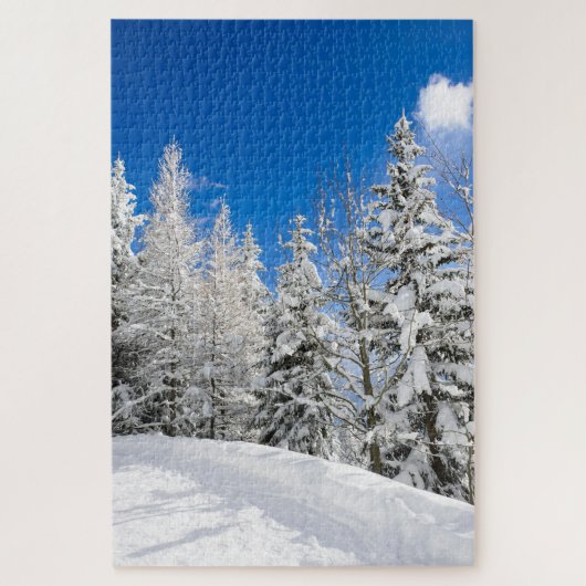 Schneebäume unter einem klaren blauen Himmel im Puzzle (Vertikal)