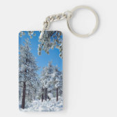 Schneebedeckte Bäume in den Bergen der Laguna Schlüsselanhänger (Rückseite)