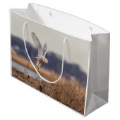 Schneeeule startet große geschenktüte (Rückseite Schrägansicht)