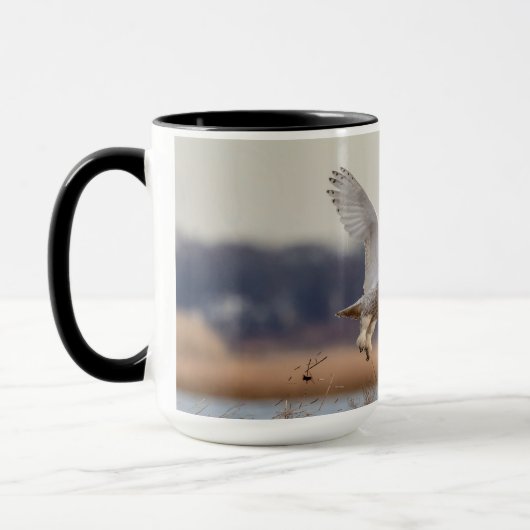 Schneeeule startet tasse (Links)